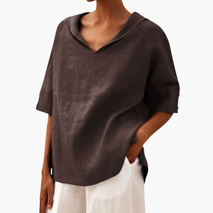 Women’s short sleeve blouse with V-neck and rolled sleeves